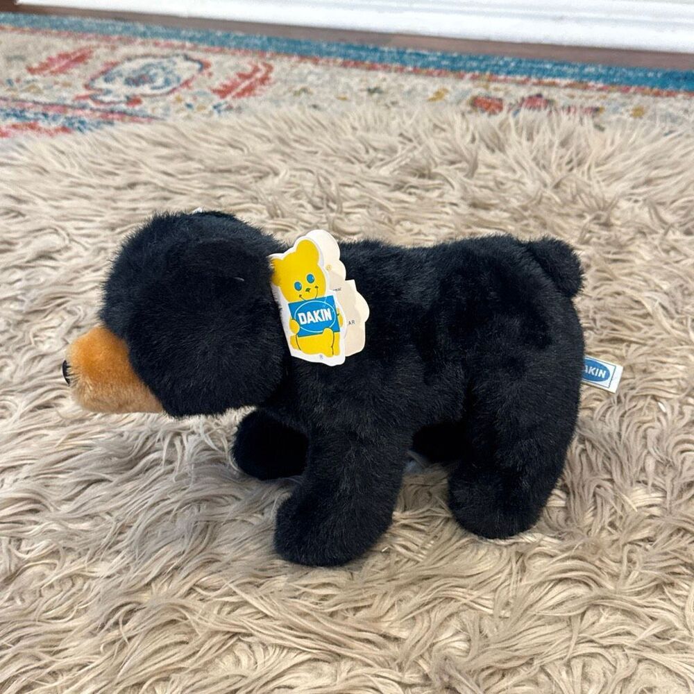 Vintage 1980s Dakin Bear plush toy with original tags
